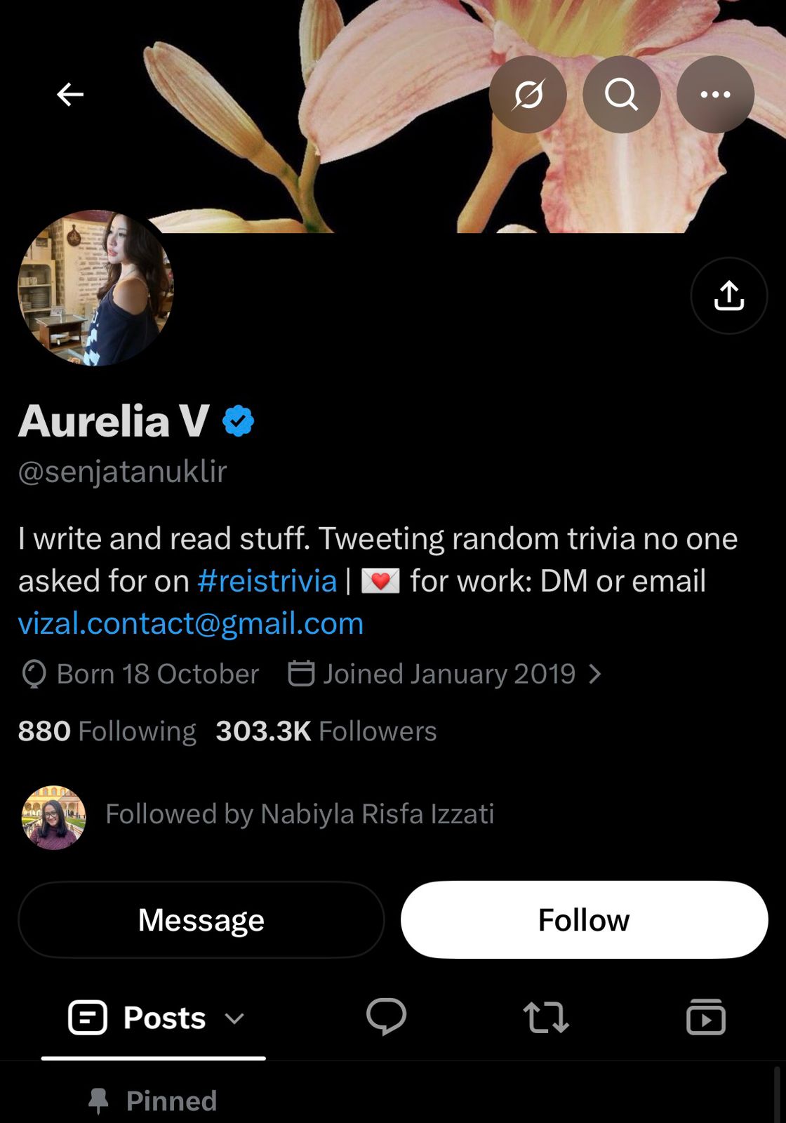 Screenshot of the X profile @senjatanuklir, display name "Aurelia V", showing about 303,300 followers